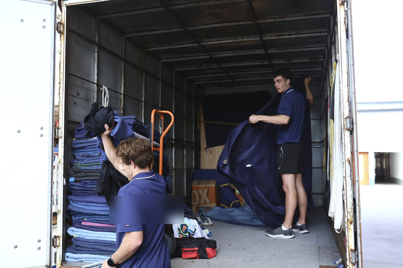 Billy and Jet working inside the truck