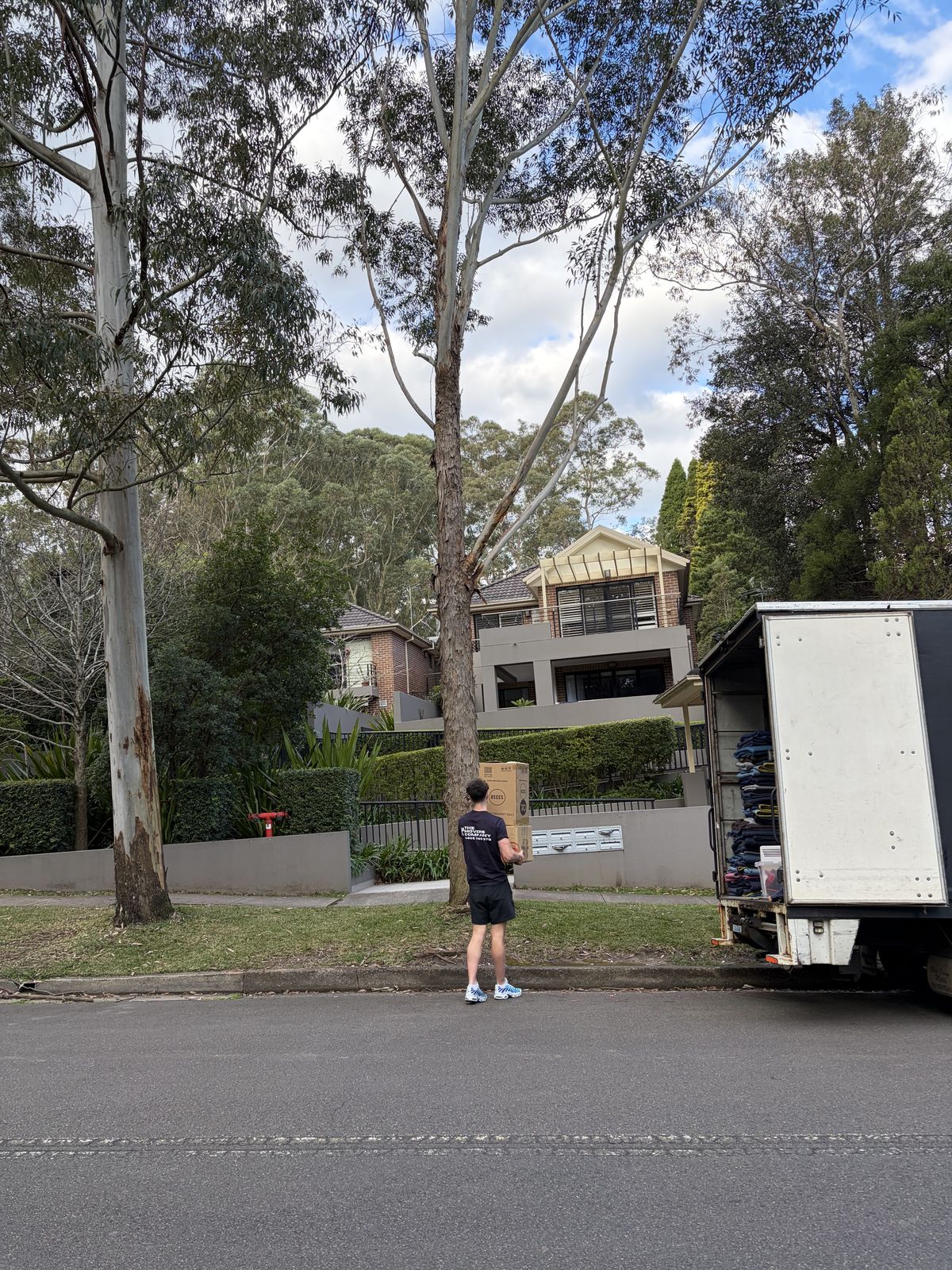 Jet carrying a box towards a letterbox
