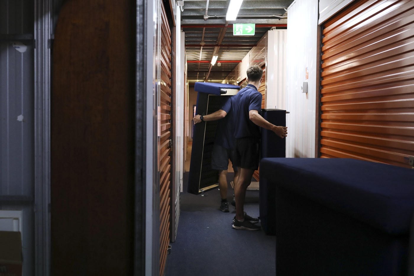 Carrying furniture through the storage corridor
