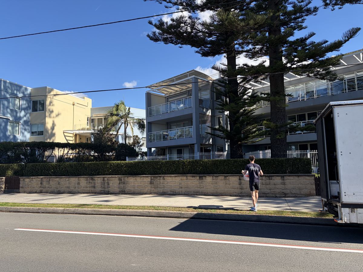 Jet carrying an item outside an apartment building in Collaroy, Sydney