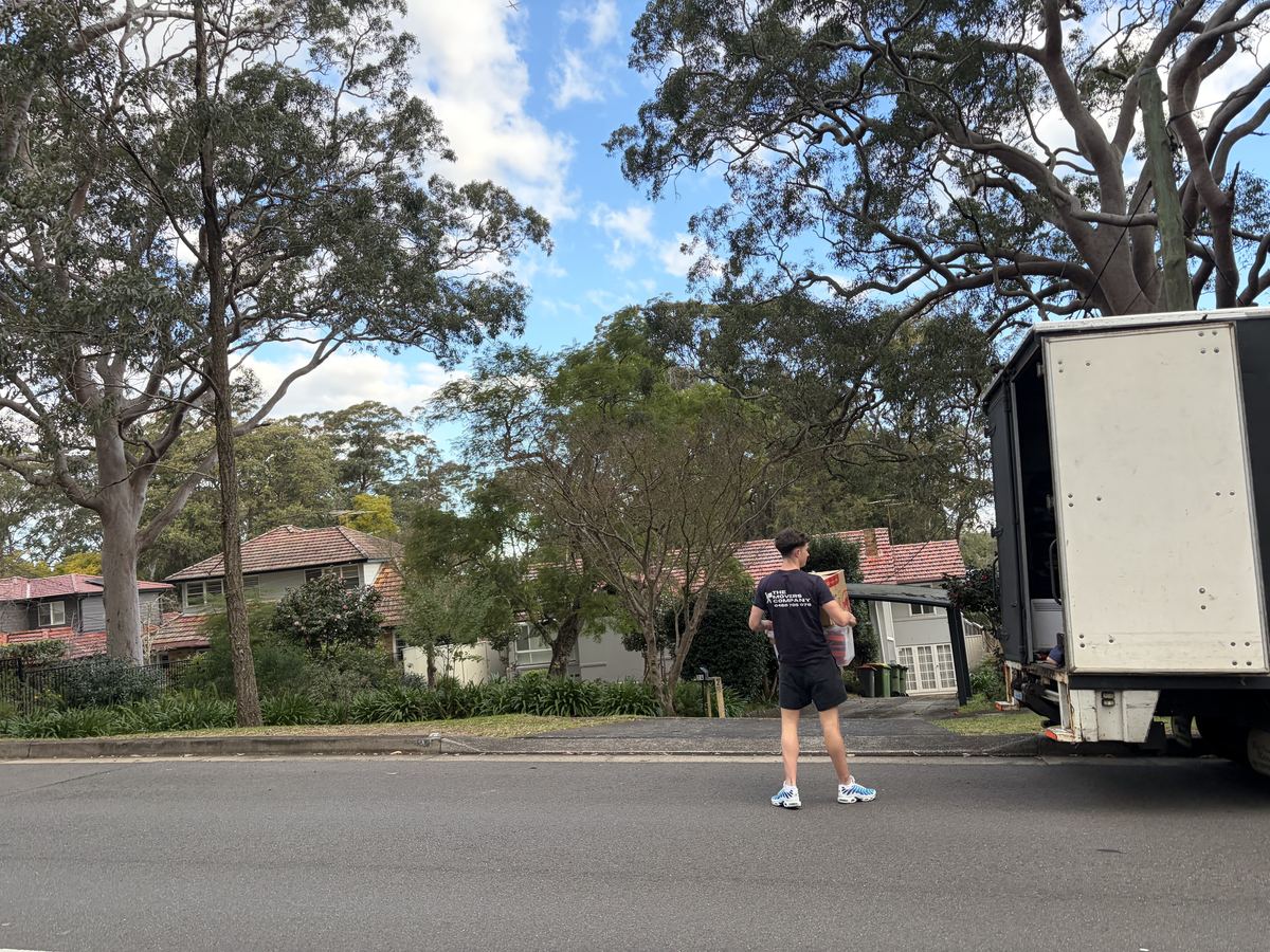 Jet carrying an item outside a house in Killara, Sydney