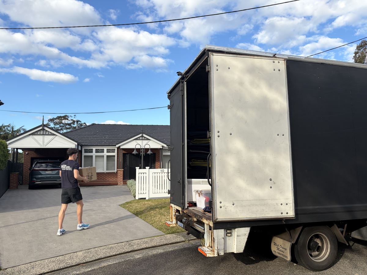 Jet carrying a box outside a house in Mona Vale, Sydney