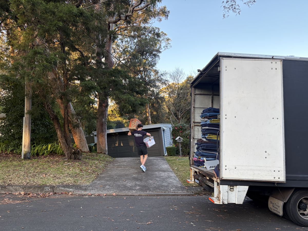 Jet carrying items outside a house in Northbridge, Sydney
