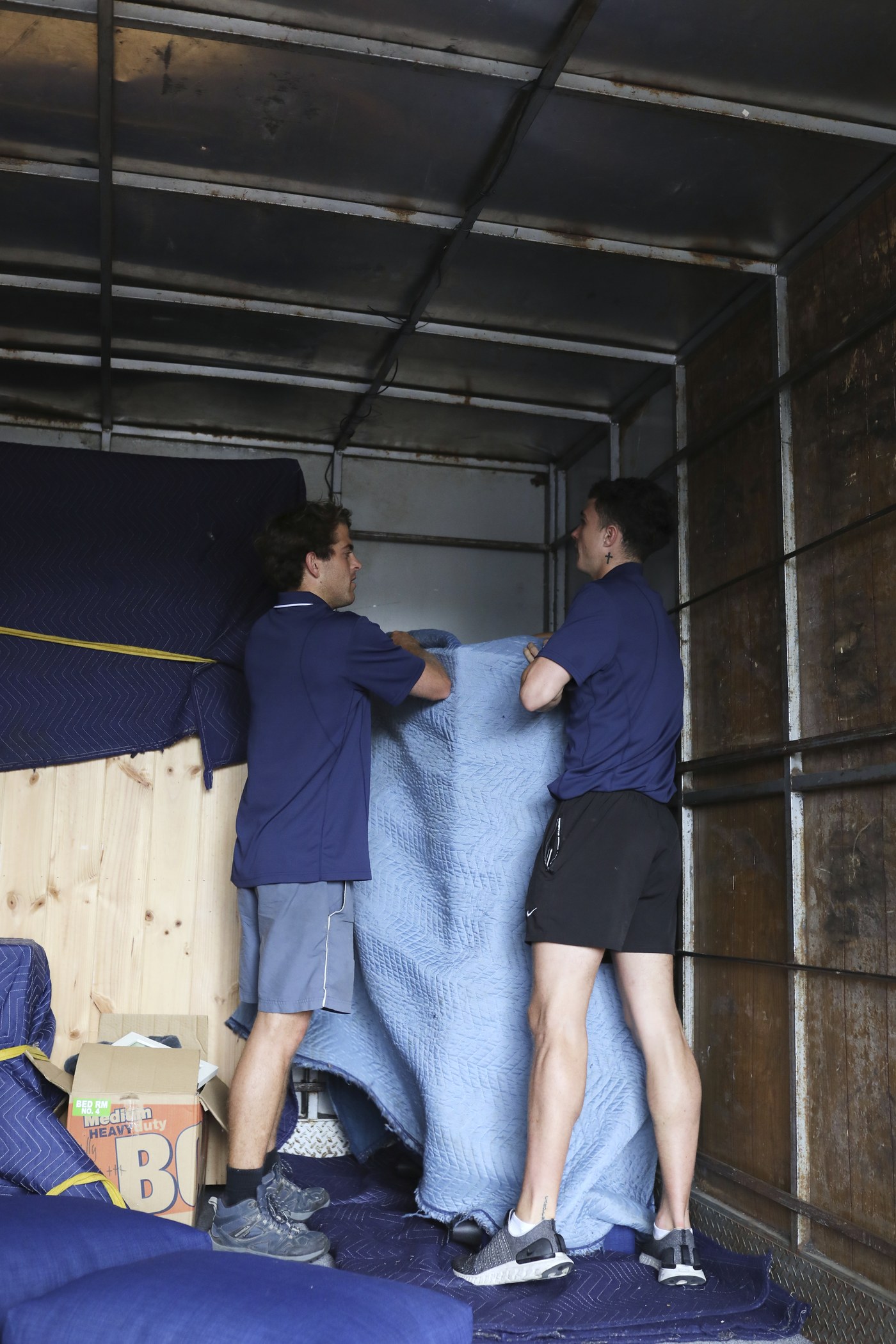 Wrapping furniture blankets in the truck